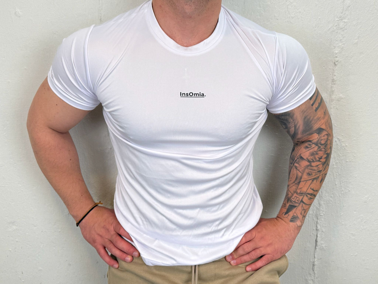 InsOmia.™ Performance Tee – Unisex. Color White