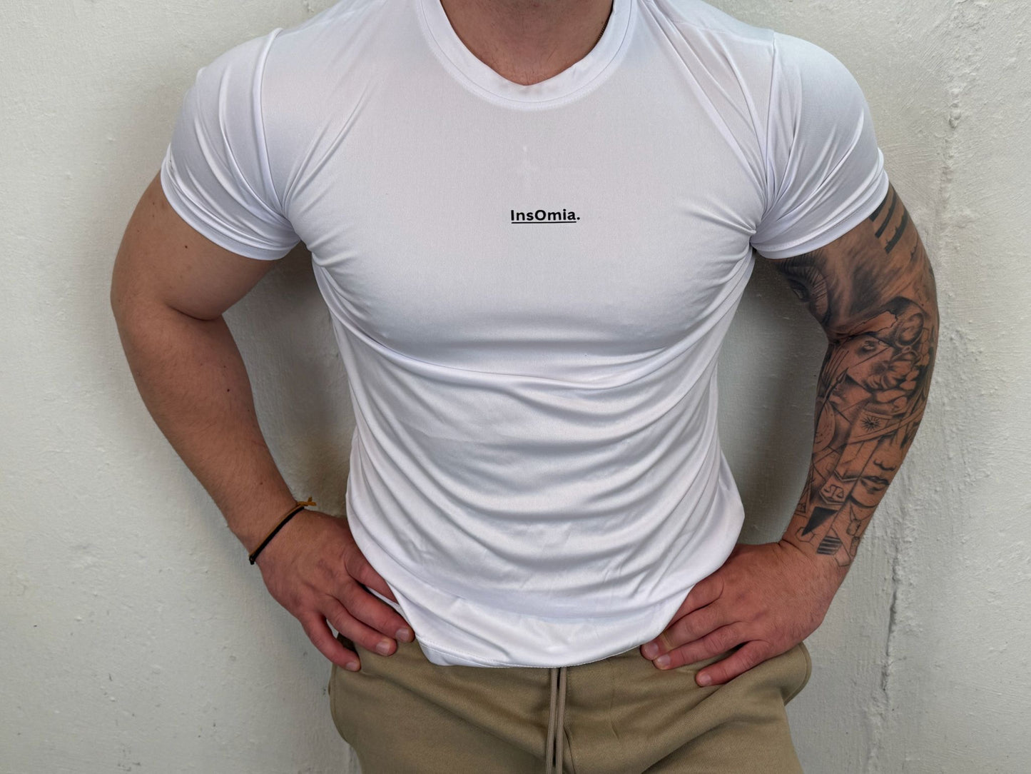 InsOmia.™ Performance Tee – Unisex. Color White