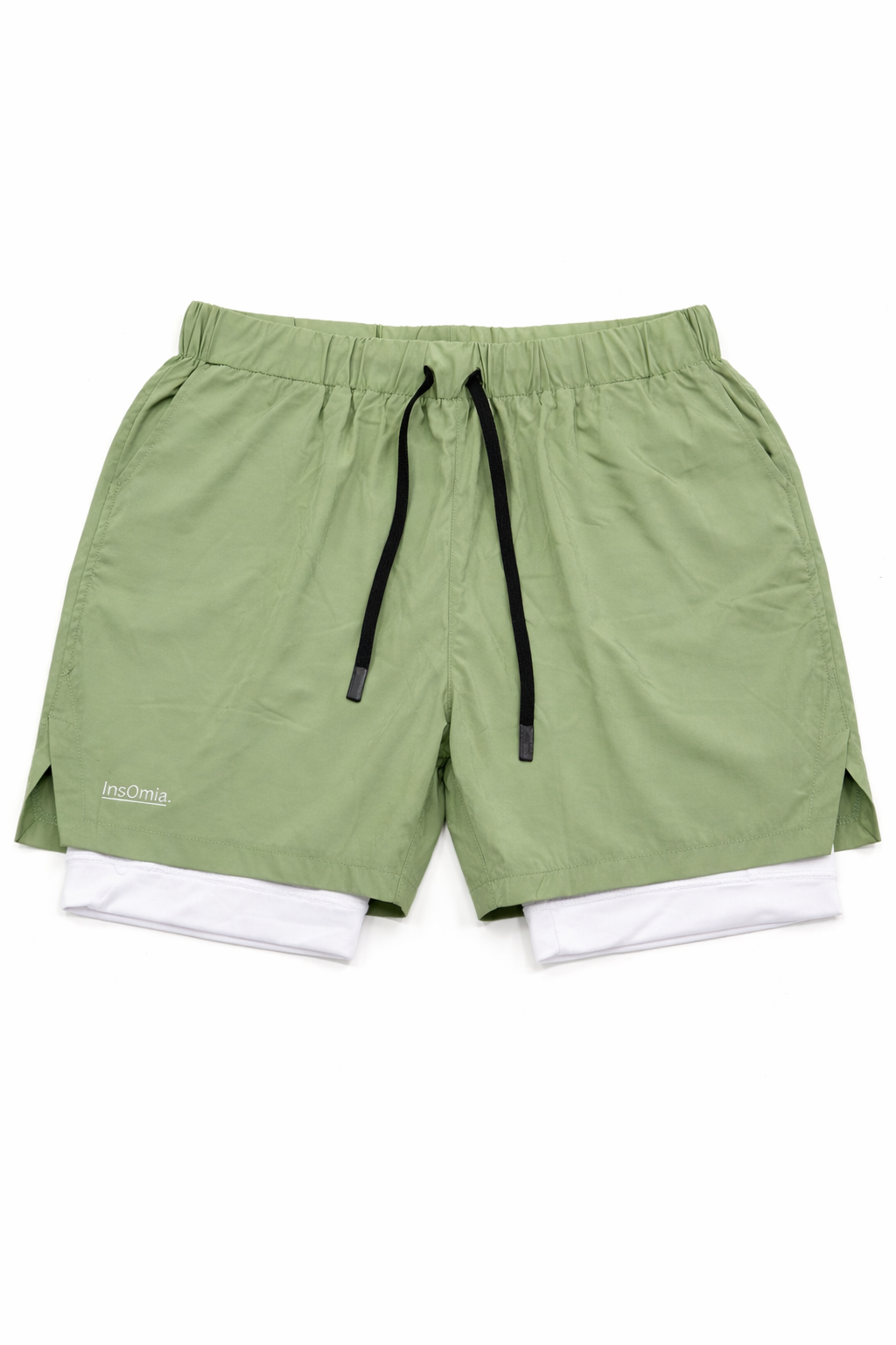 Green shorts with a white inner layer on a white background