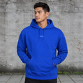 Men wearing a classic blue pullover hoodie with kangaroo pocket against a gray wall